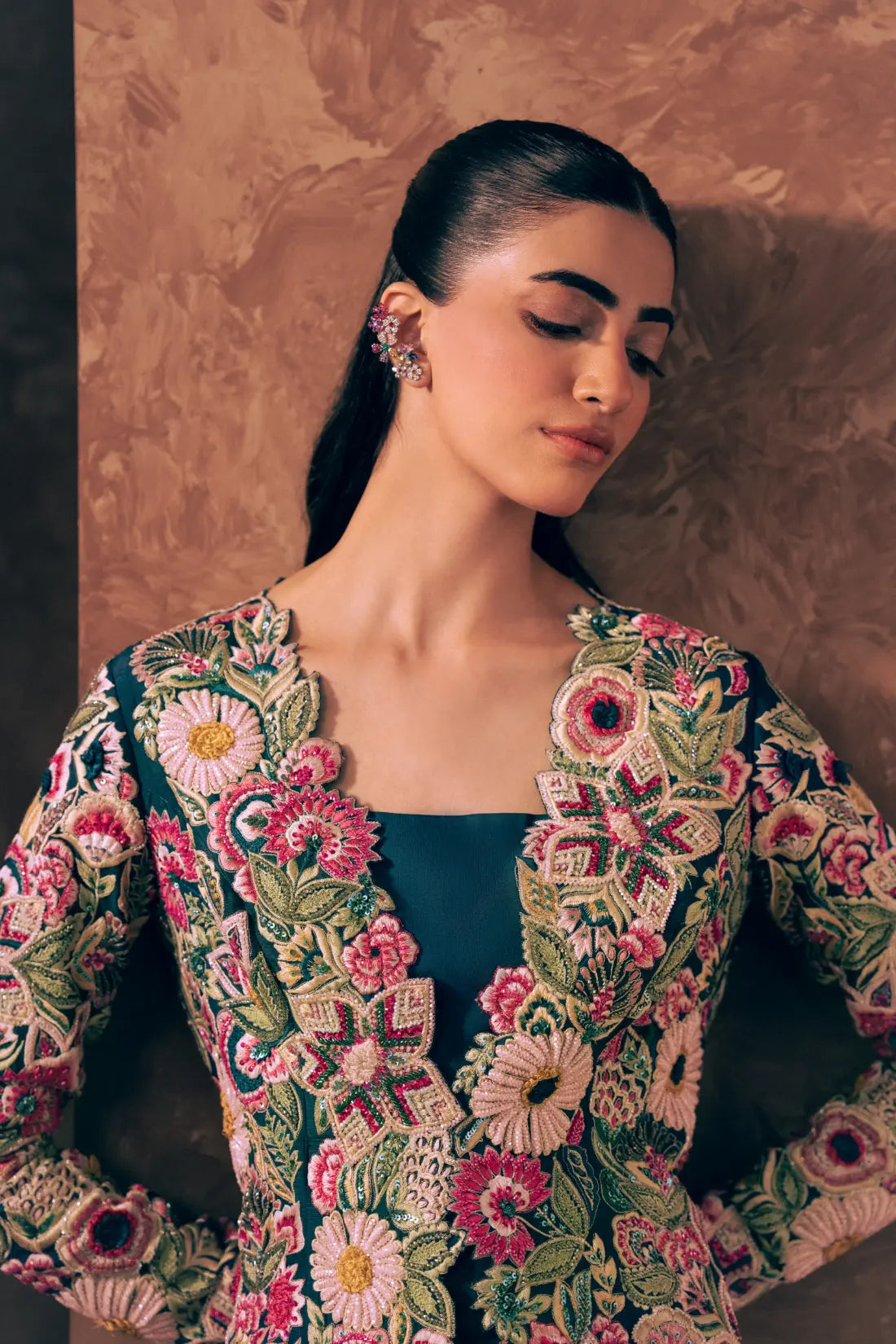 Close-up of scalloped neckline and multicolour floral embroidery on Floral Fiesta Pakistani formal dress for women