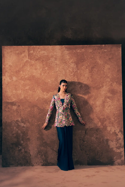 Pakistani formal wear peplum and satin silk skirt set from Floral Fiesta collection, styled for weddings and festive occasions