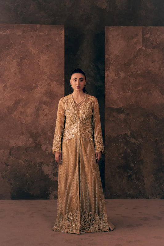 Woman wearing Vestis Pret Ivory Opulence 3 piece Pakistani formal dress with open front jacket, blouse and wide-leg pant, front view