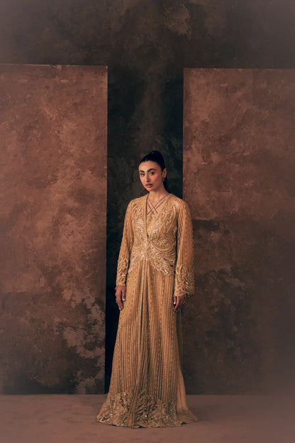 Full-length view of Vestis Pret Ivory Opulence 3 piece formal dress with champagne gold beaded net jacket, blouse and pant