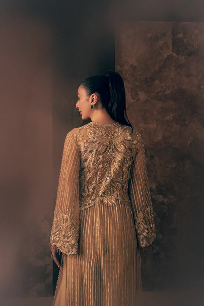 Close-up of hand-embroidered jacket back and bell sleeves with beaded tassel cuffs on Ivory Opulence luxury Pakistani formal wear