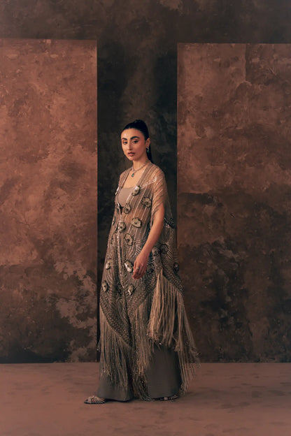Side view of Lunar Grace luxury Pakistani clothing with beaded fringe cape, blouse and raw silk trouser