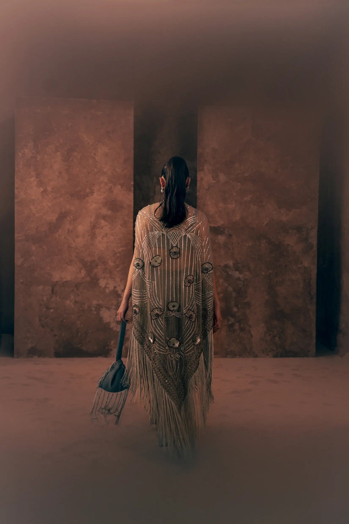 Back view of Vestis Pret Lunar Grace 3 piece Pakistani formal dress showing art deco beaded pattern and fringe on net cape
